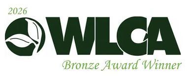 A green WLCA 2026 Bronze Award Winner logo with a leaf icon on a white background.