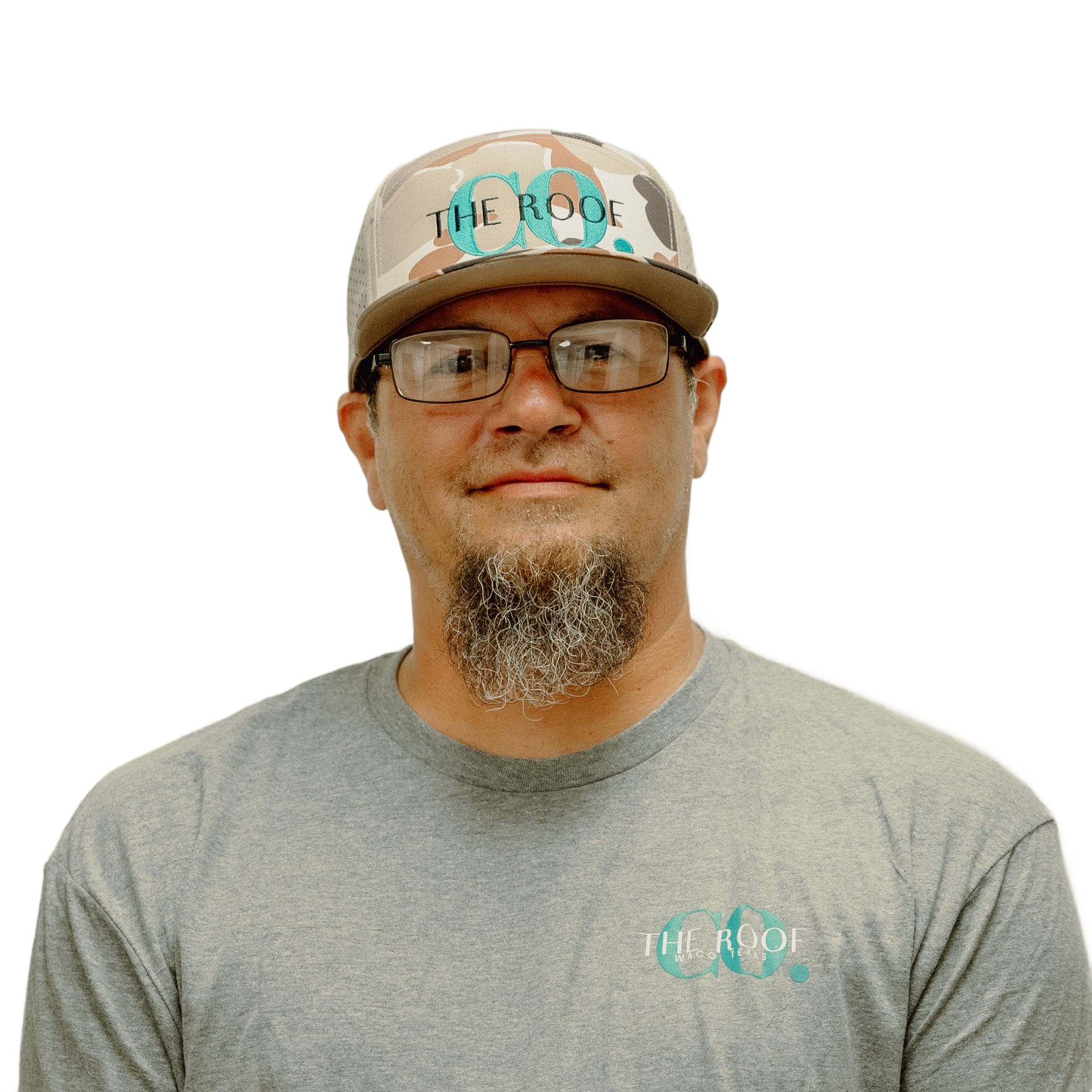 Man with glasses and goatee wearing a hat and shirt with 