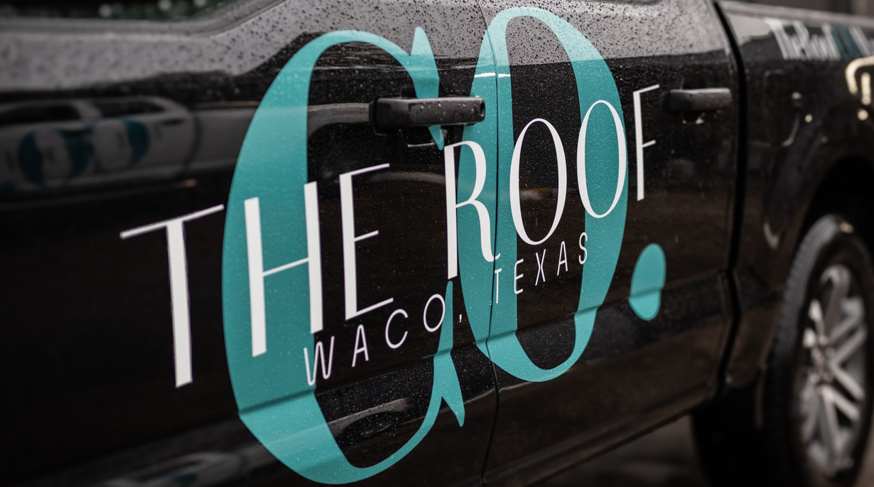 Person wearing a baseball cap and shirt with 