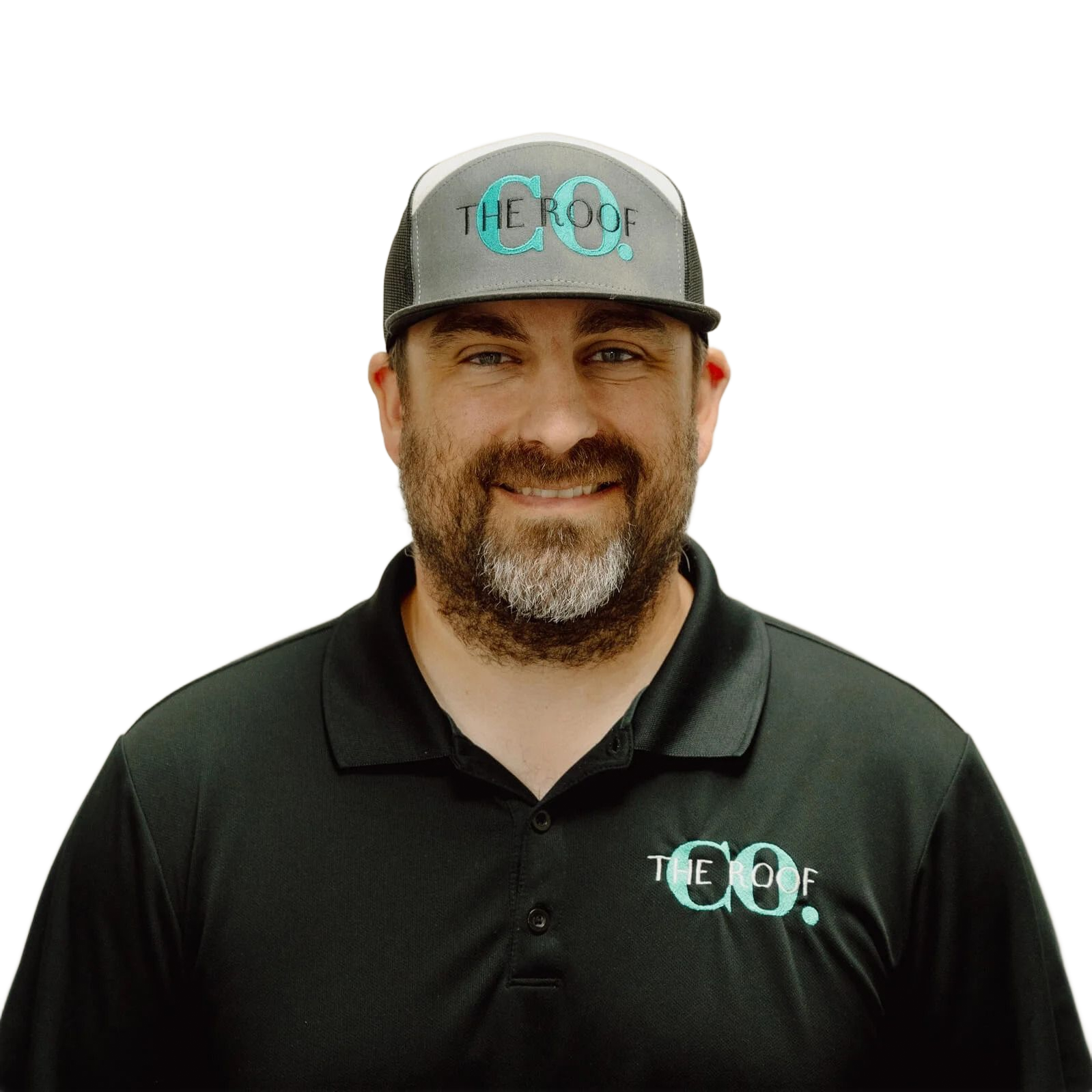 Man in a baseball cap and polo shirt, smiling, with the logo 