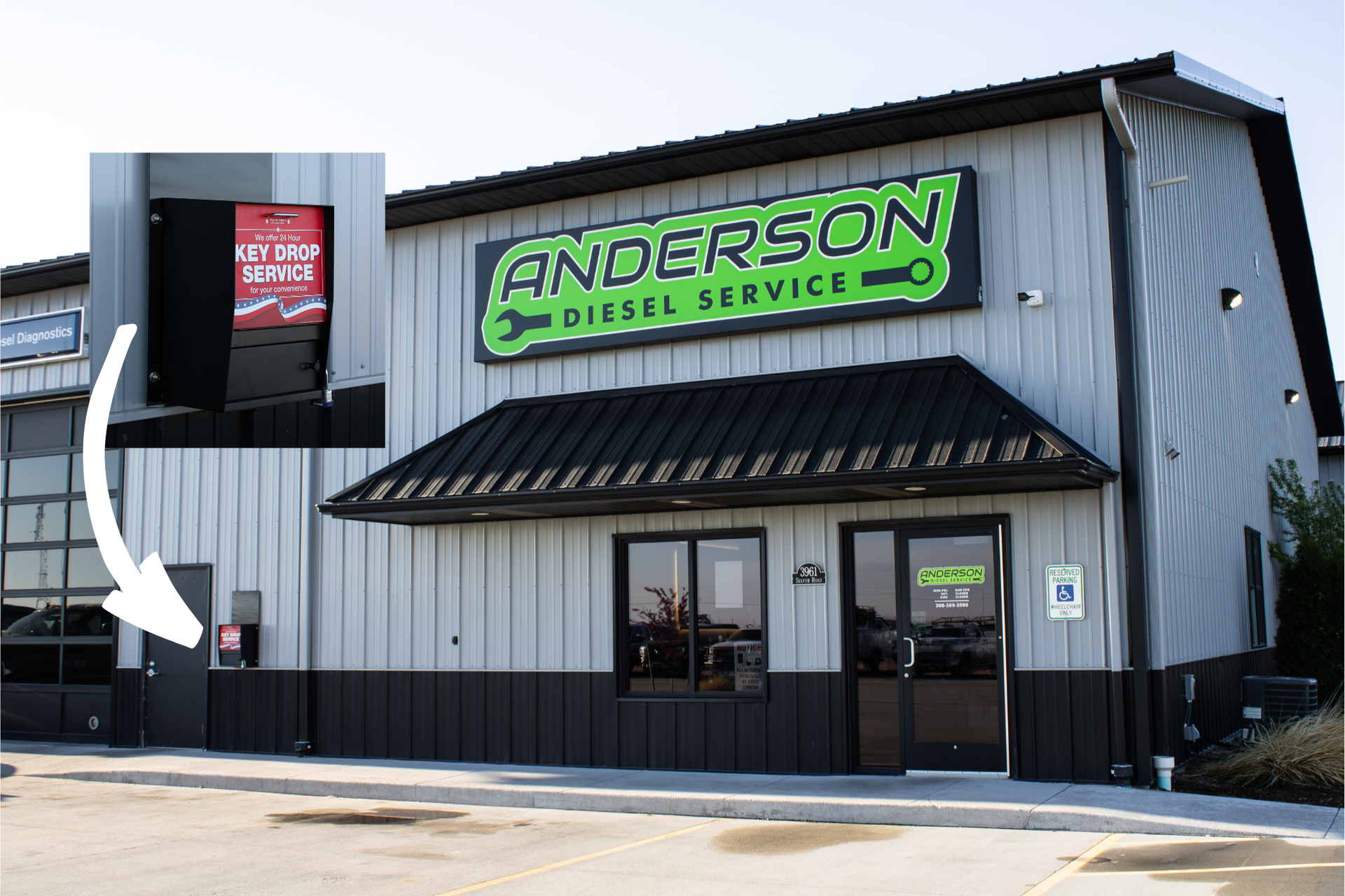 Exterior of Anderson Diesel Service with a zoomed-in inset showing a red night drop box for keys next to a side door.