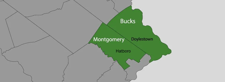 Map highlighting Bucks and Montgomery counties in green; Doylestown and Horsham labeled.