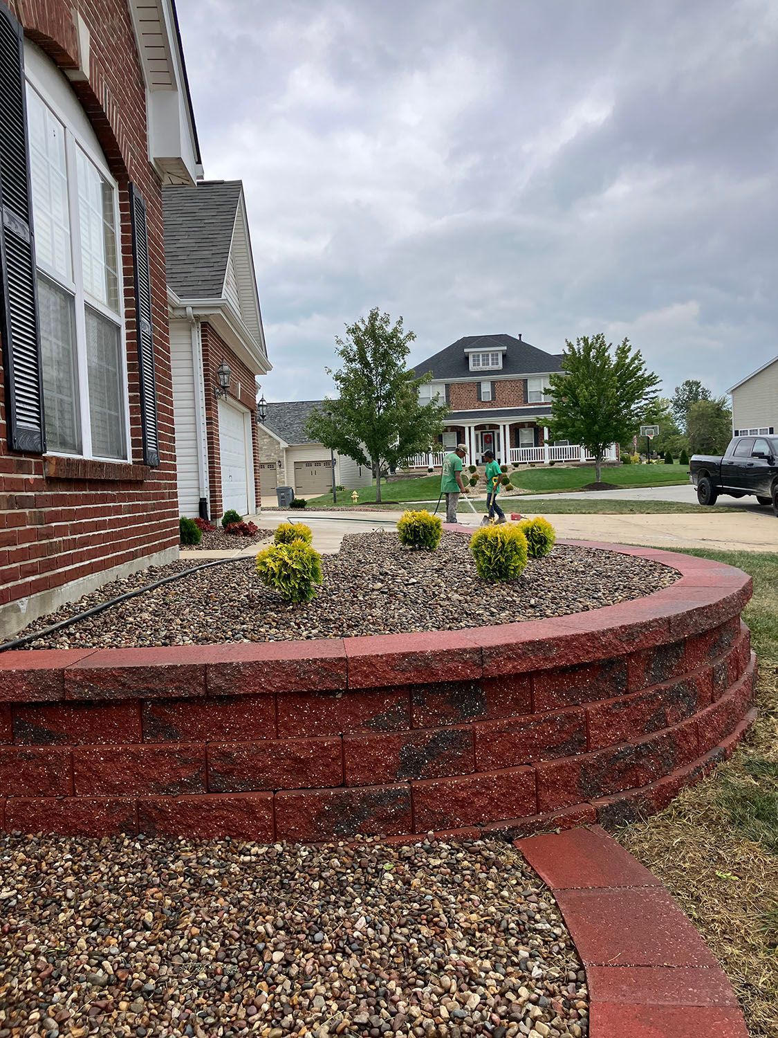 a mini garden supported by a retaining wall