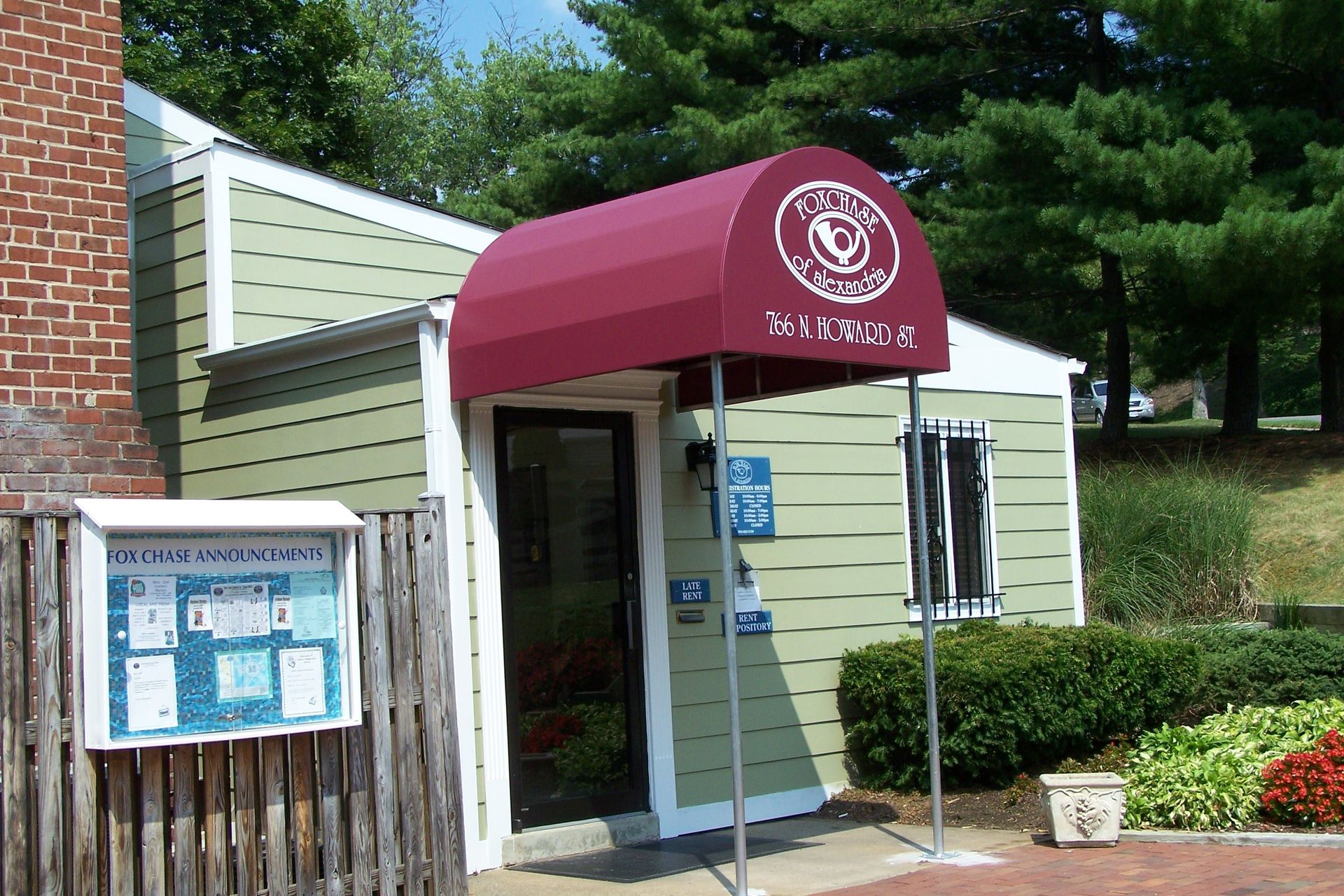 A blue and yellow awning that says french fries