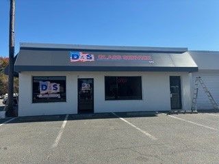 A brick building with a lot of loading docks and stairs