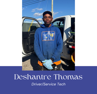 Man in blue hoodie and gloves standing in front of a white truck; text below reads 