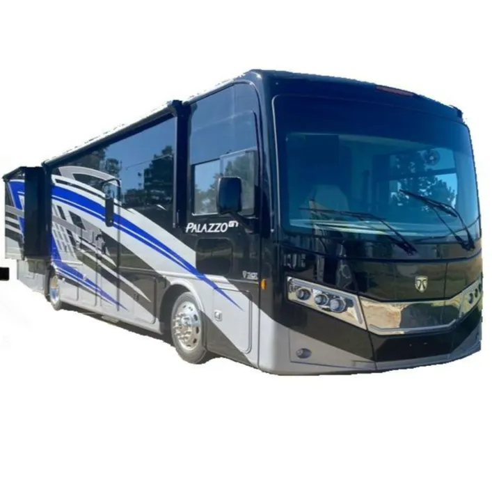 A black, white, and blue Thor Palazzo Class A motorhome parked against a white background