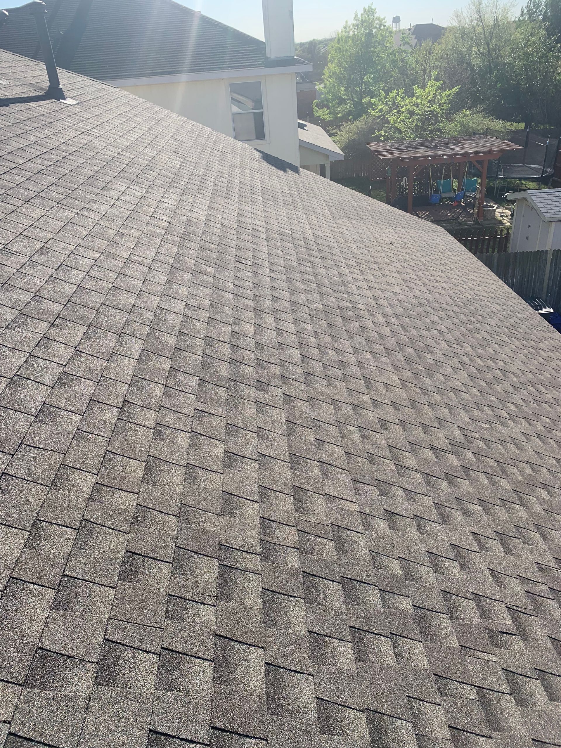 the roof of a house with a lot of shingles on it .