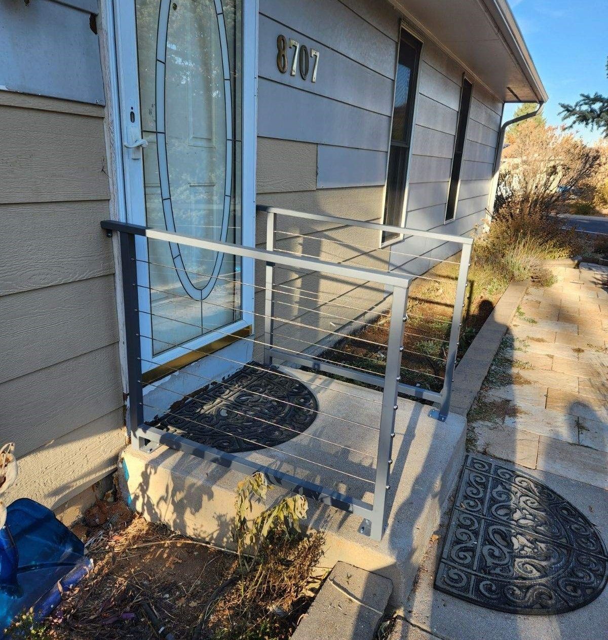 The front door of a house with the number 807 on it
