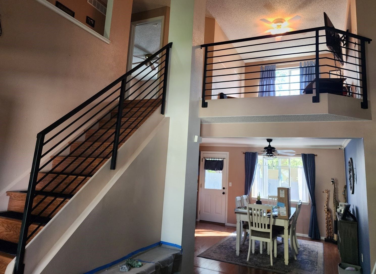 A house with stairs leading up to the second floor