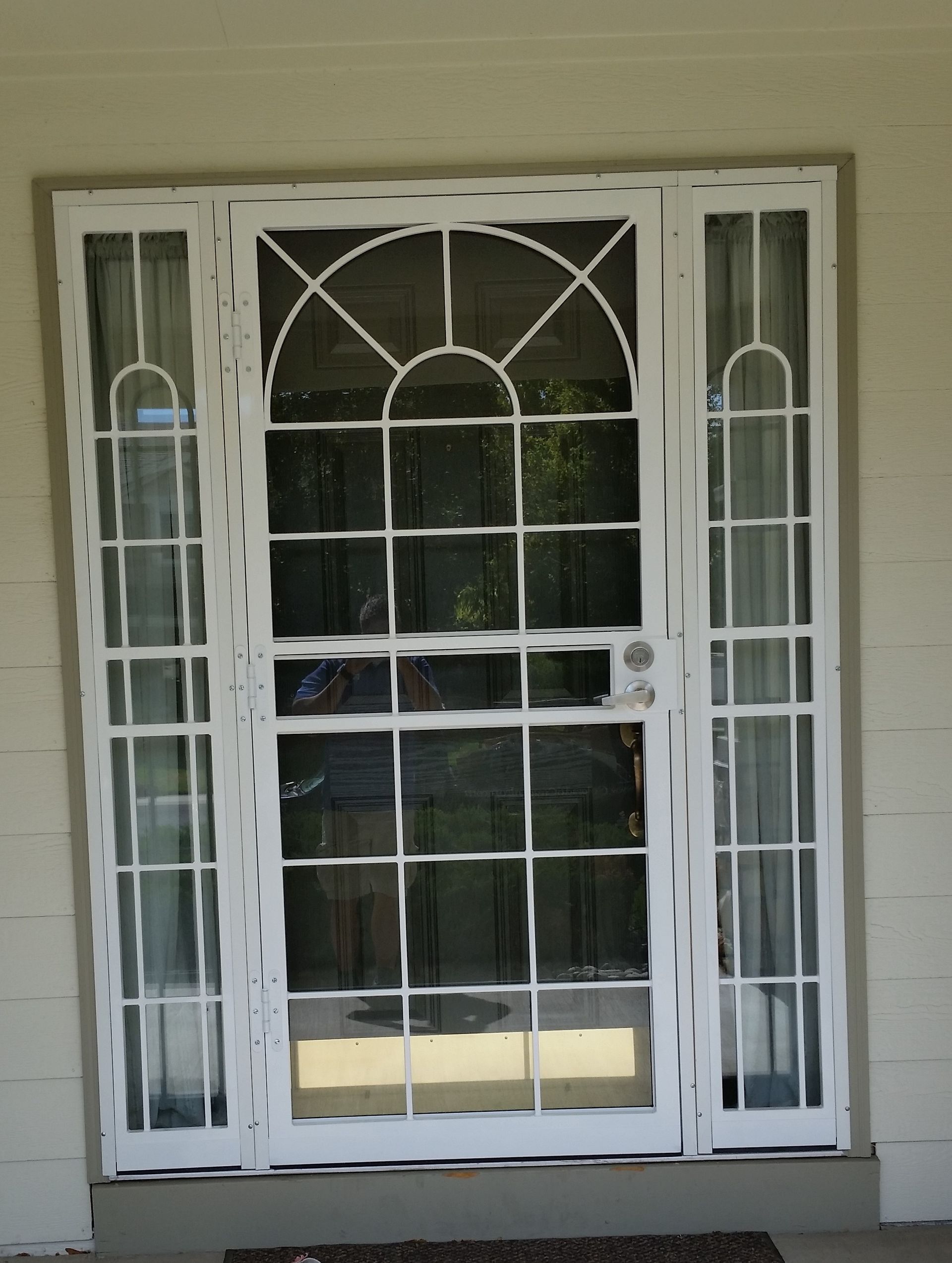 A white door with a grid pattern on it