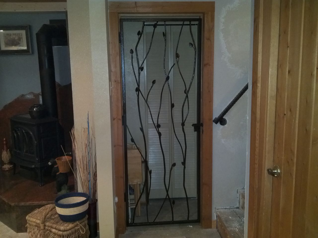 A door with a wrought iron design on it