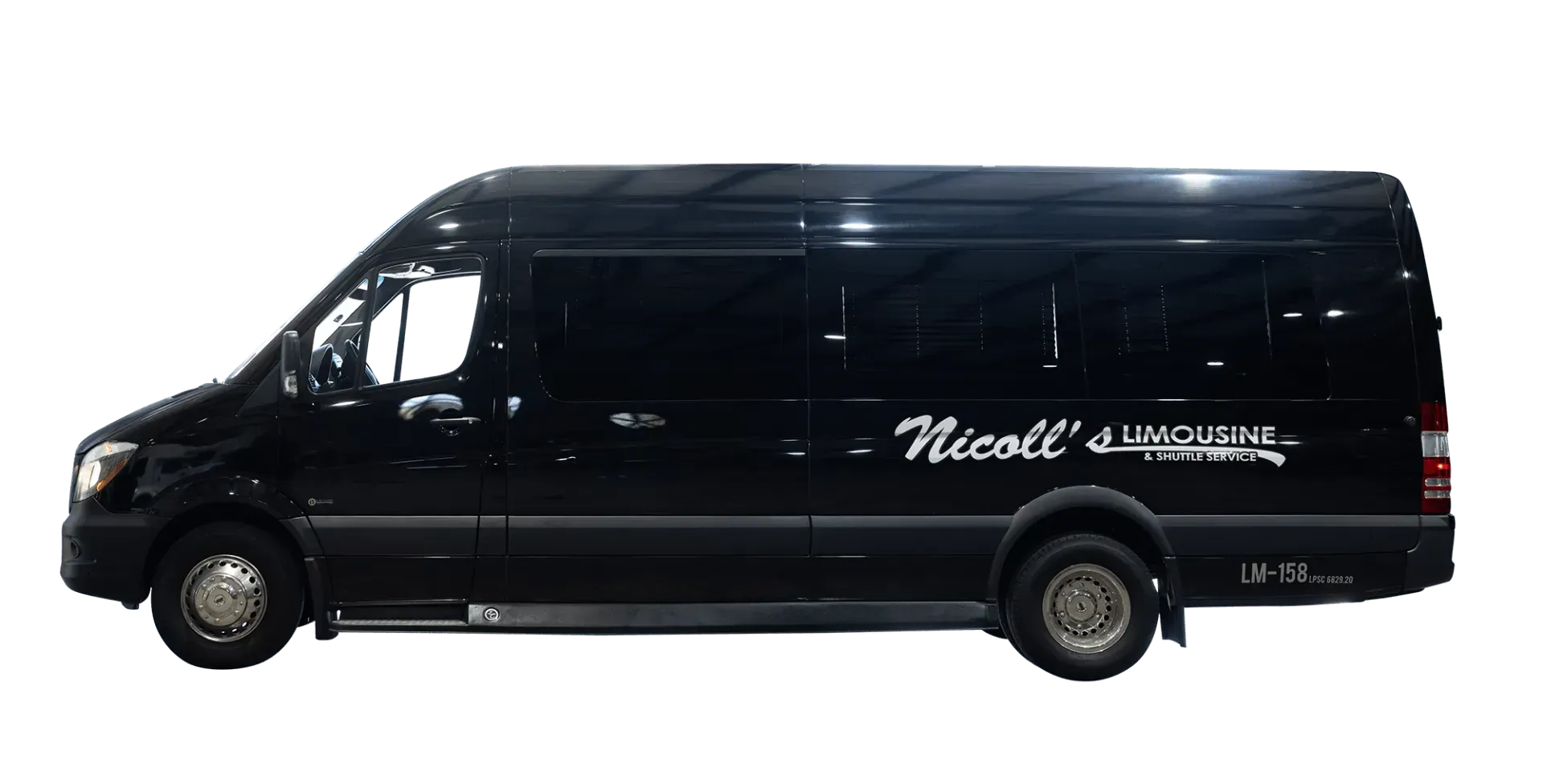 Black Nicoll's Limousine van, side view, dark tinted windows, parked.