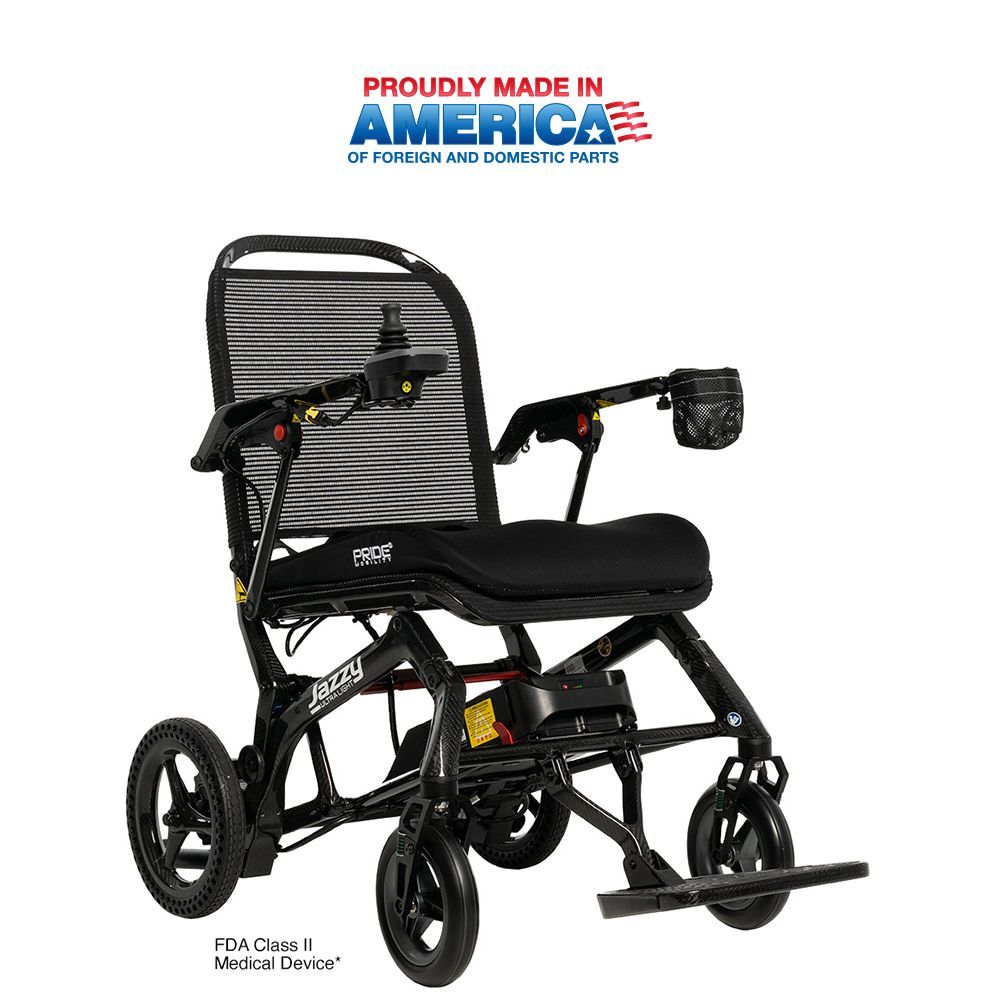 A red and black electric wheelchair on a white background.