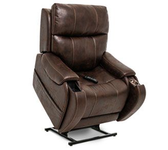 A brown leather recliner with a remote control on it.
