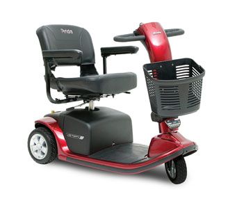 A red mobility scooter with a basket attached to it.