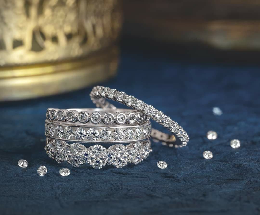 Three rings are stacked on top of each other on a table