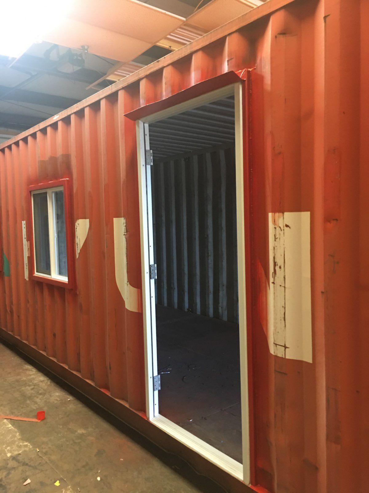shipping container with window and door