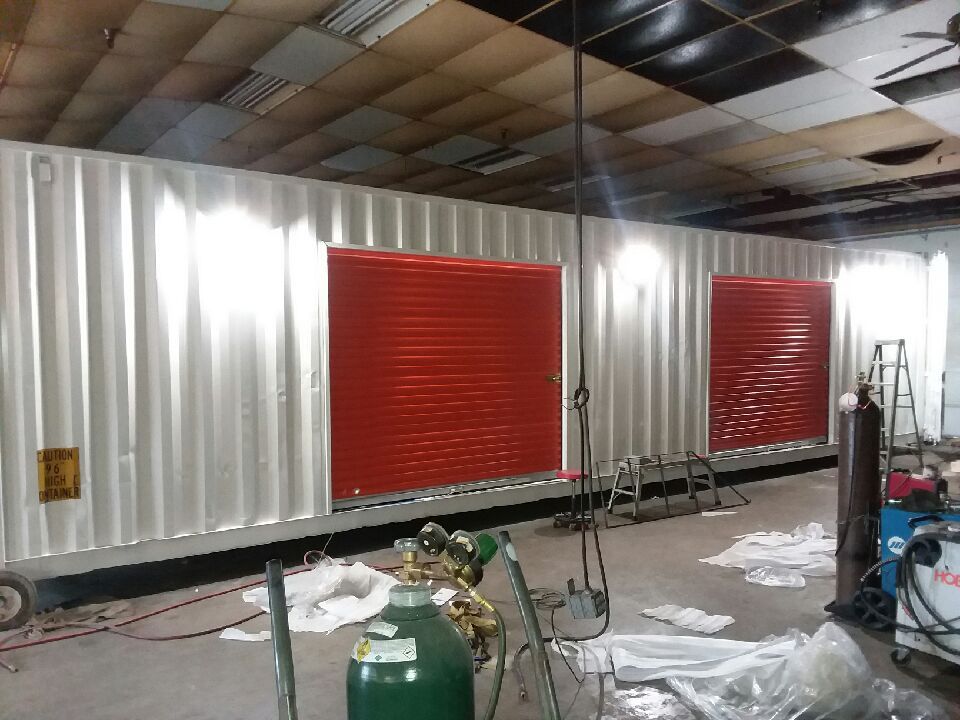 shipping container with roll up doors