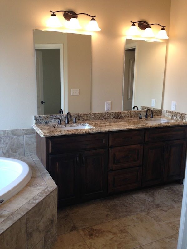 His-and-hers sinks and a bathtub