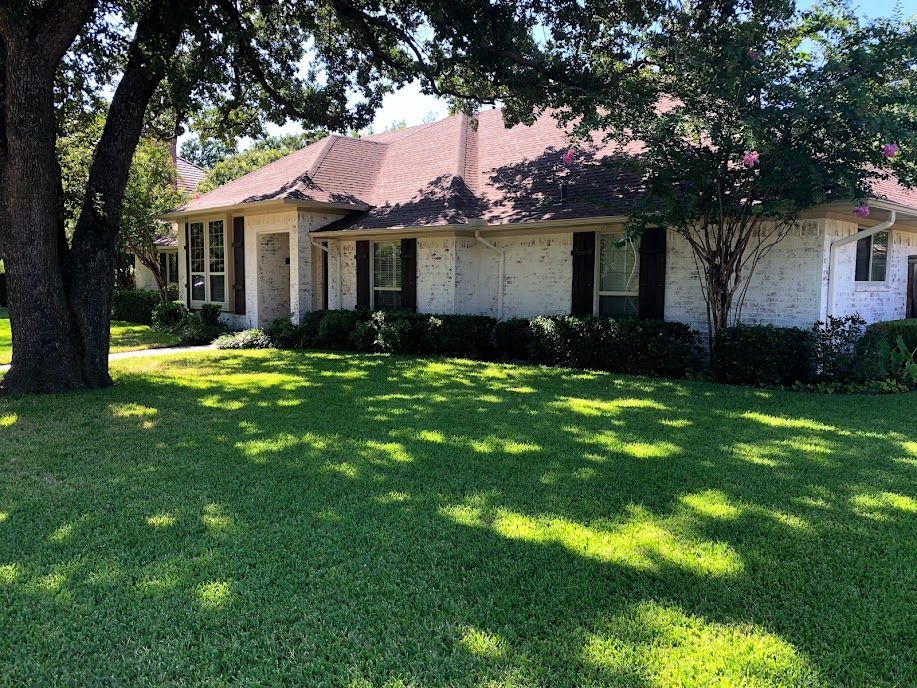 A white house with black shutters
