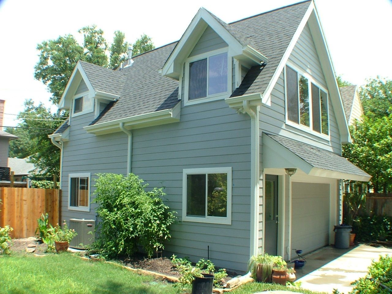 A house with a garage and a lot of windows