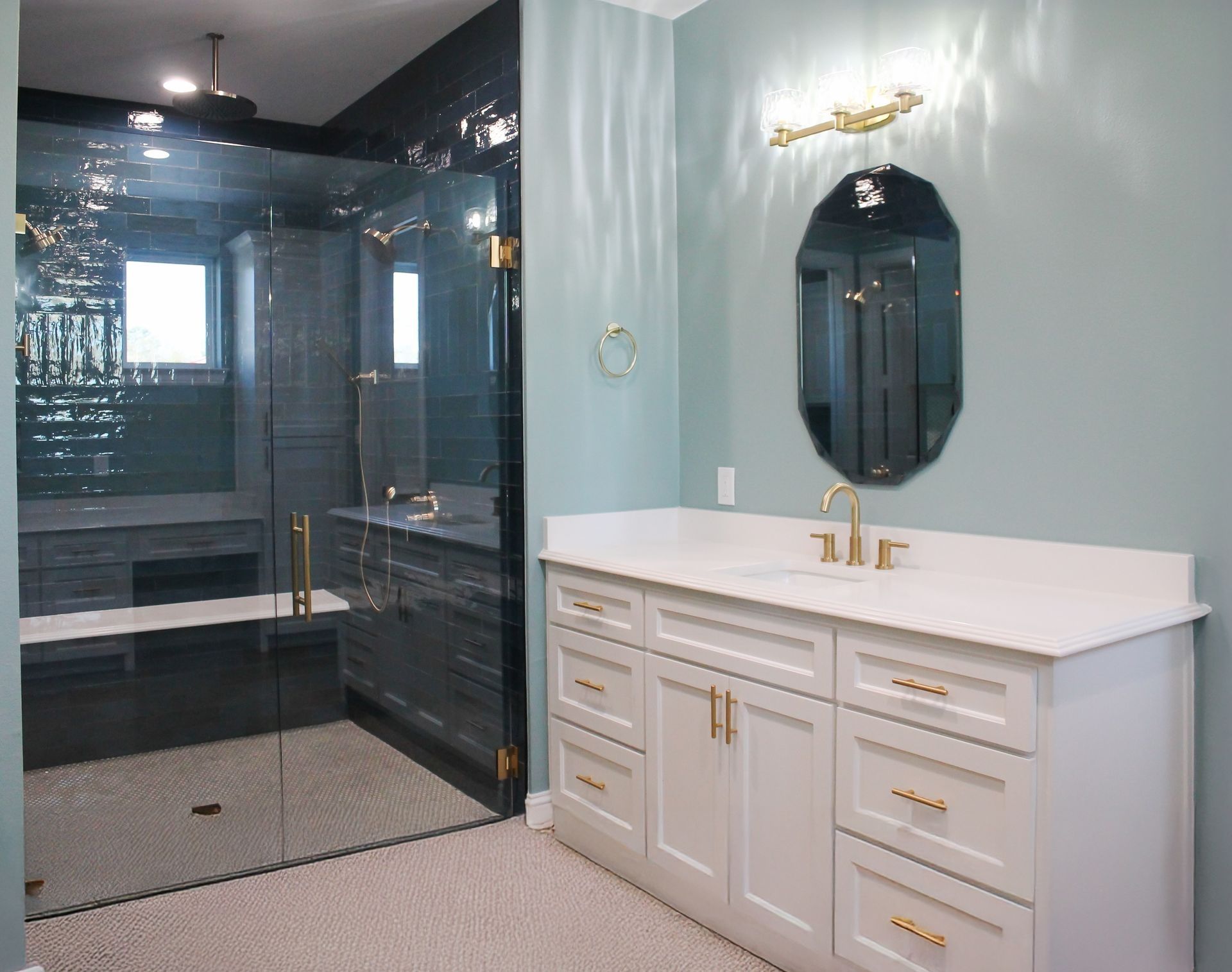 A bathroom with a baby blue wall paint