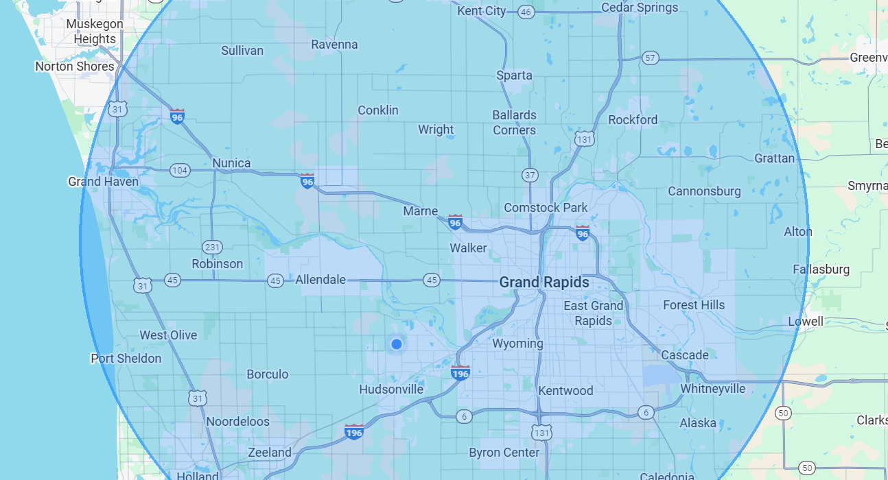 Map of a region, showing roads and cities within a blue-tinted circle; likely a service area.