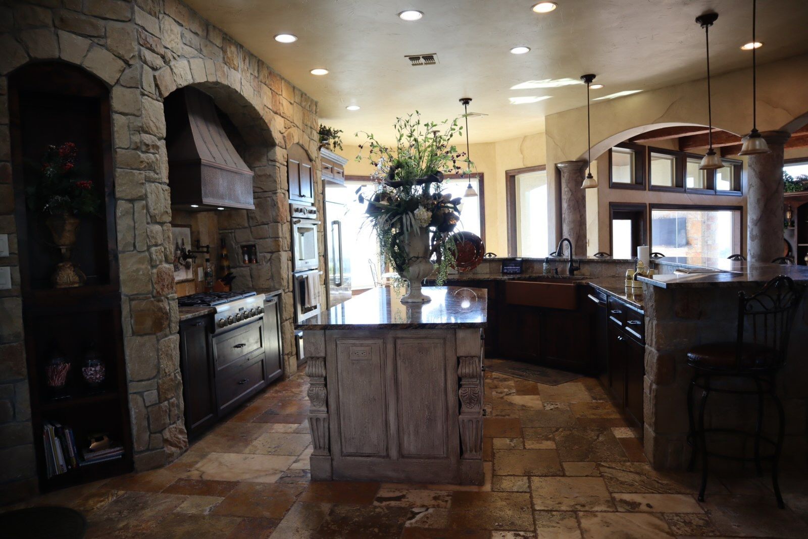 a kitchen with a large island in the middle