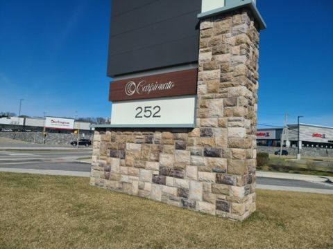 a large stone sign with the number 252 on it