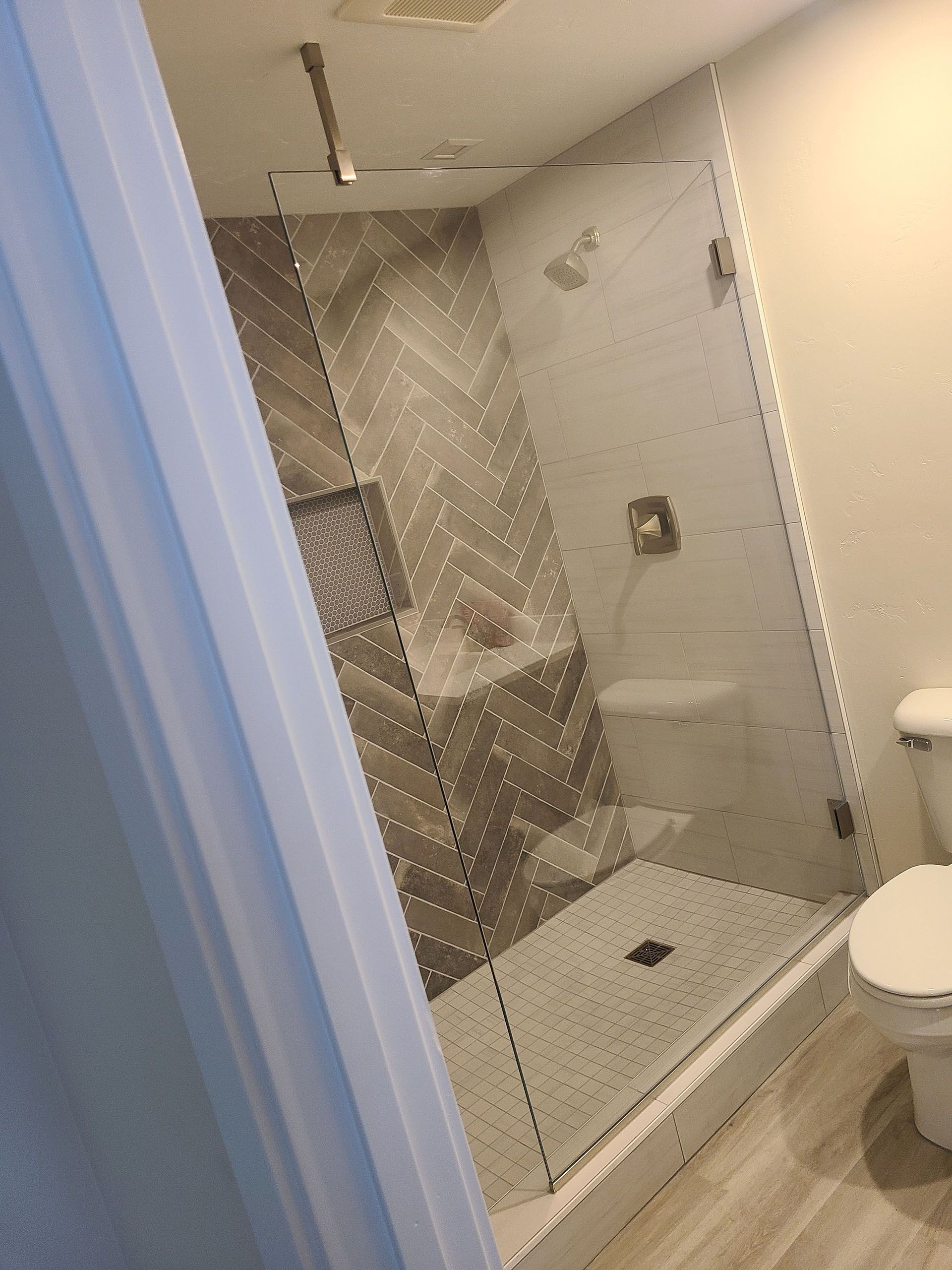 Just Panel (No Door) - A bathroom with a walk-in shower and a toilet.