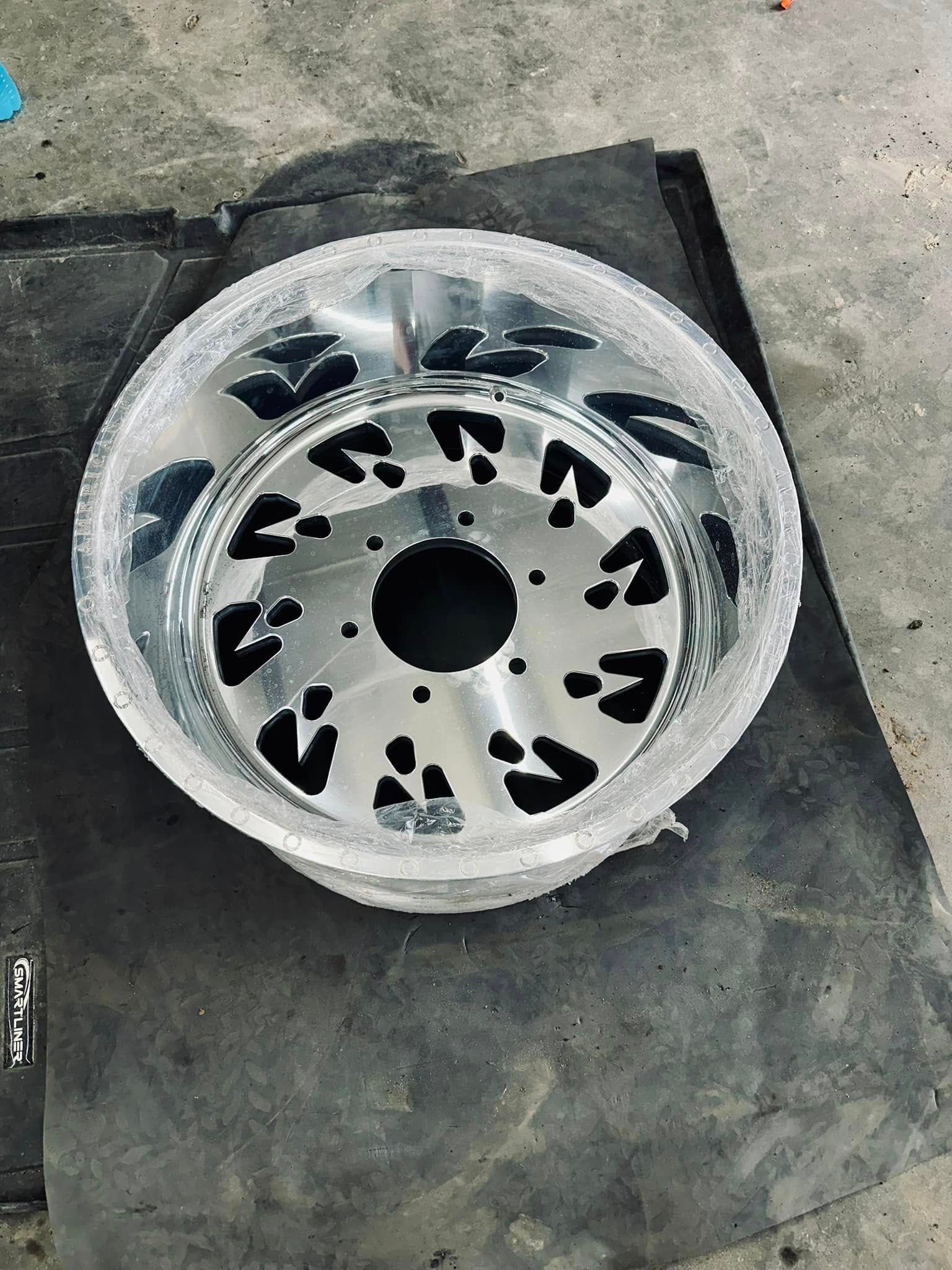 A close up of a wheel on a table.