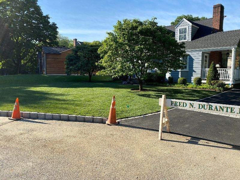A house with a sign that says Fred N. Durante Jr.