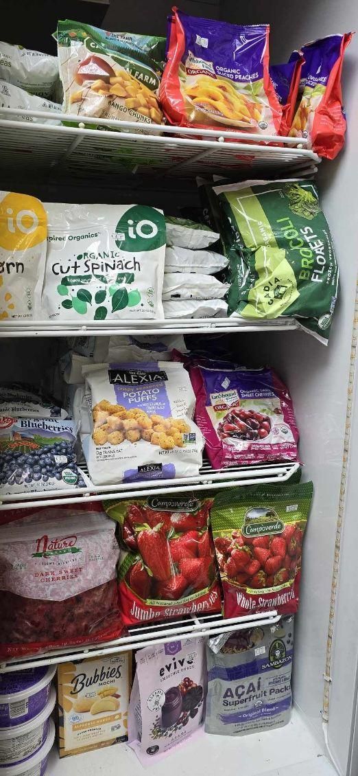 A refrigerator filled with a variety of frozen foods.