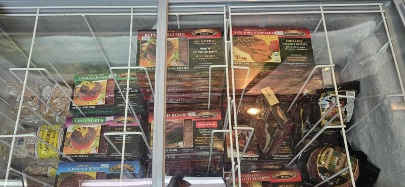 A freezer filled with a variety of frozen foods.