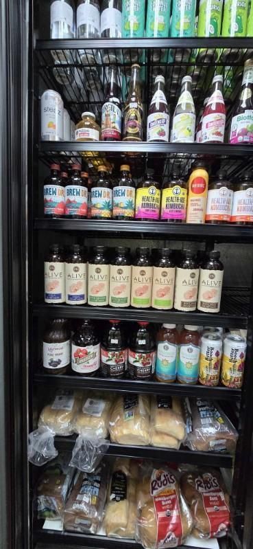 A refrigerator filled with lots of food and drinks.