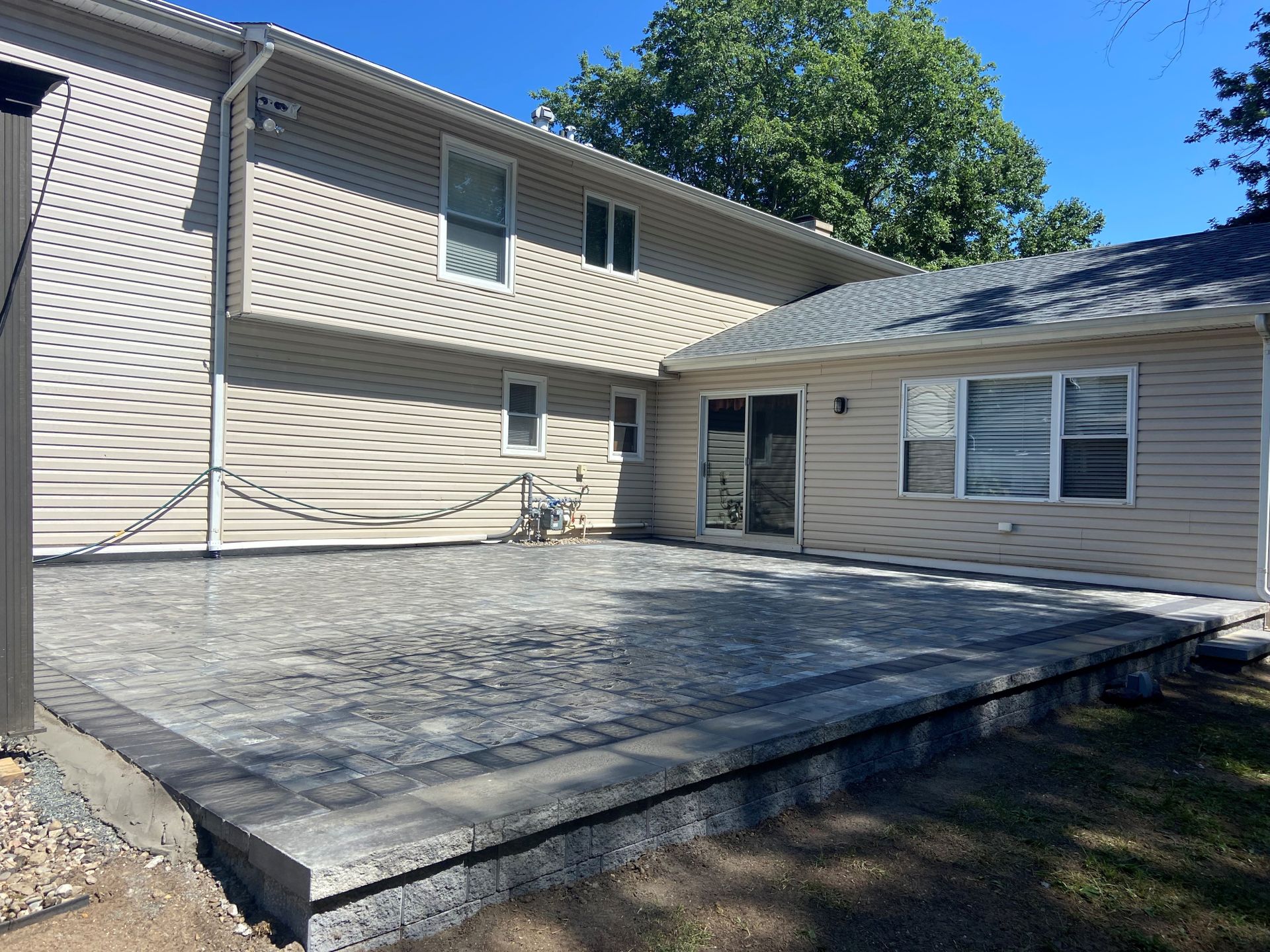 Tan-House-back-patio