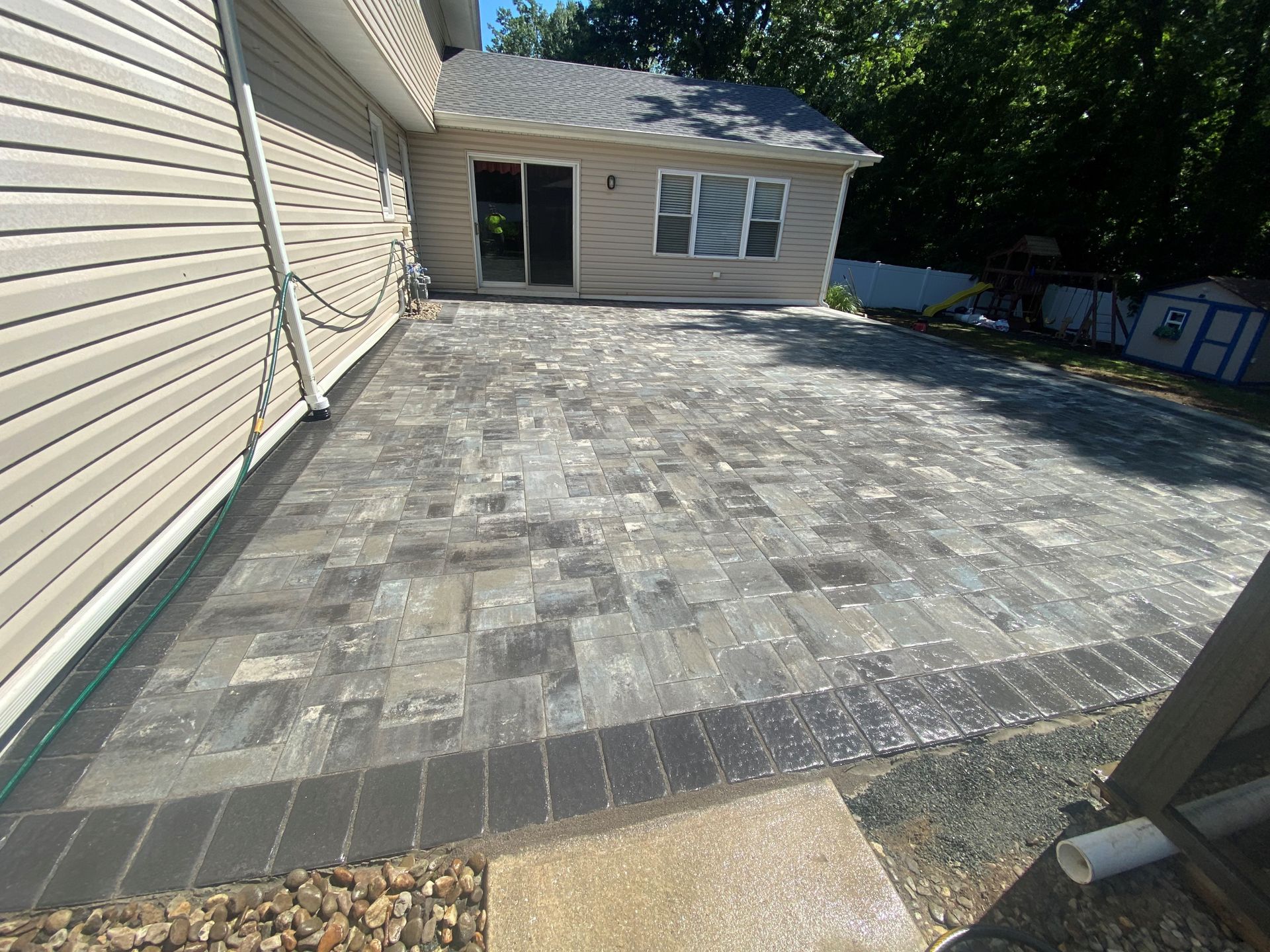 Tan-House-Gray-back-patio