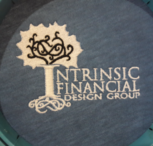An embroidered logo for the ntrinsic financial design group
