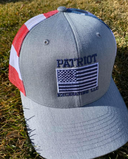 A patriotic hat with the word patriot on it