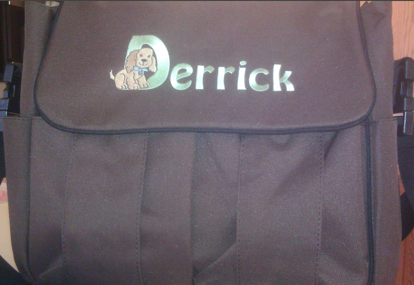 A black bag with the name derrick on it