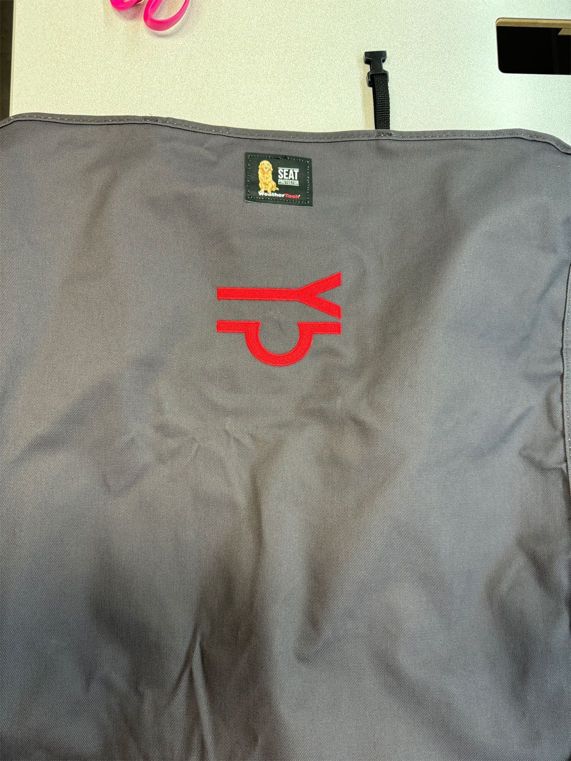 A gray bag with the letter y on it