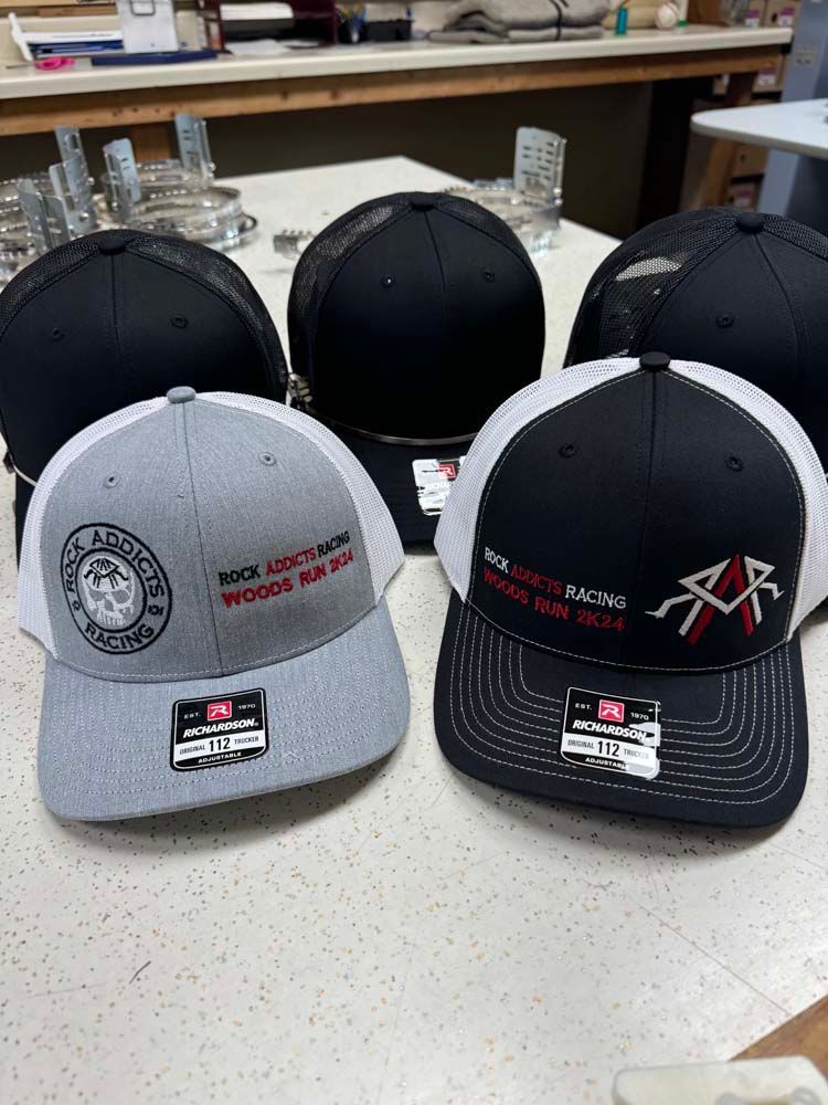 Promotional hats in various colors and styles.