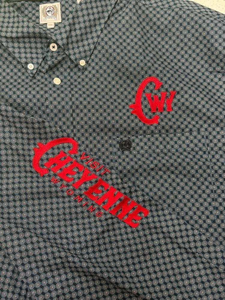 Patterned shirt with red Cheyenne  logo.