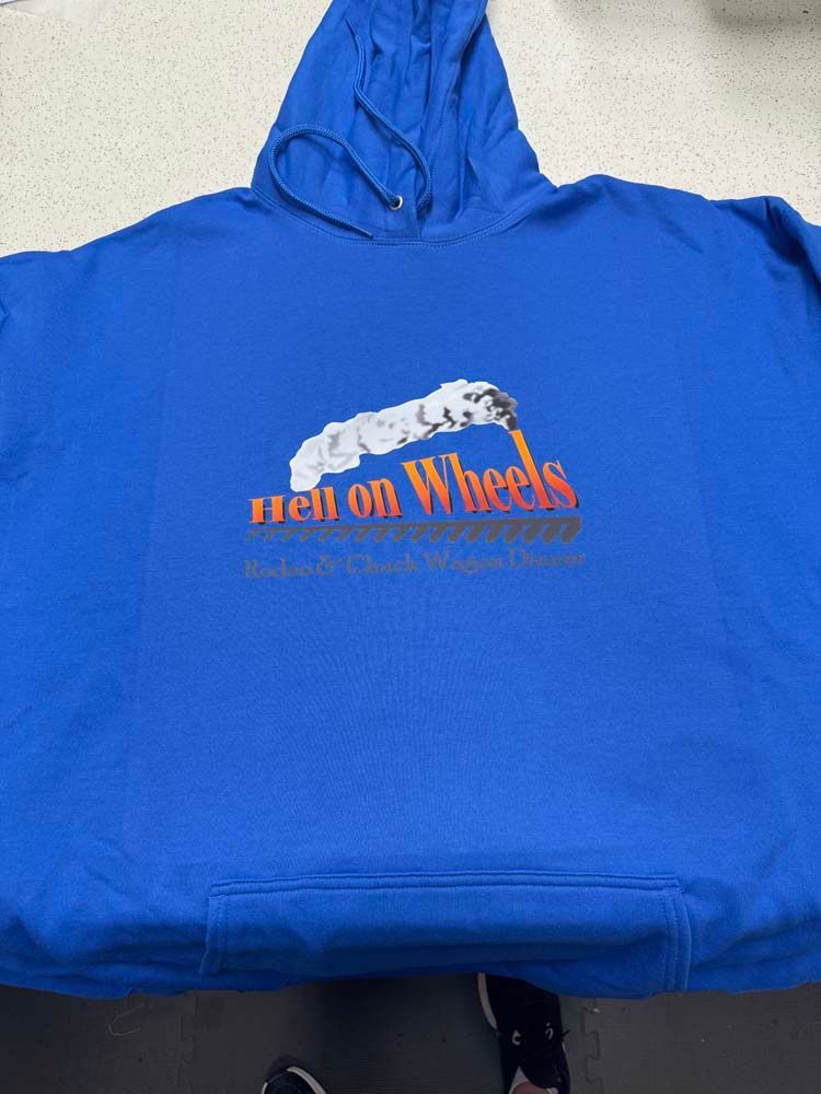Blue hoodie with Men on Wheels logo in orange and white.