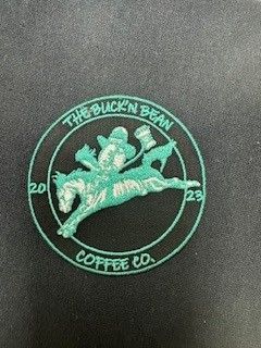 Bucking horse with a cowboy in a hat.