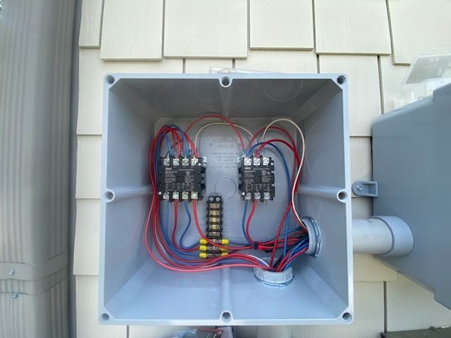 A box with a bunch of wires inside of it