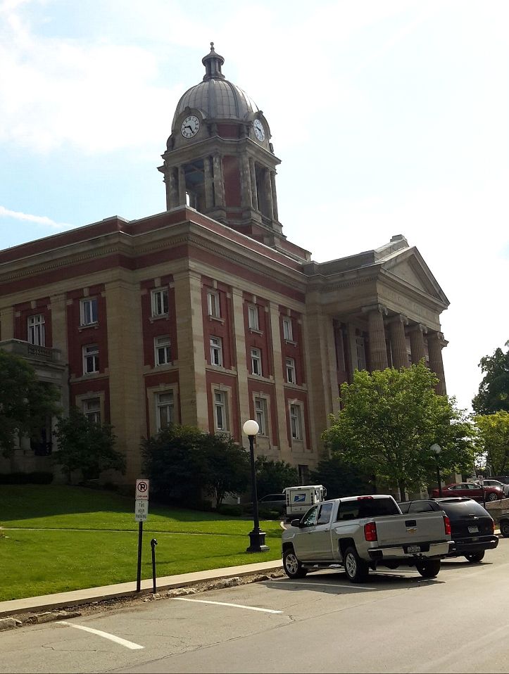 A large building with a clock on top of it