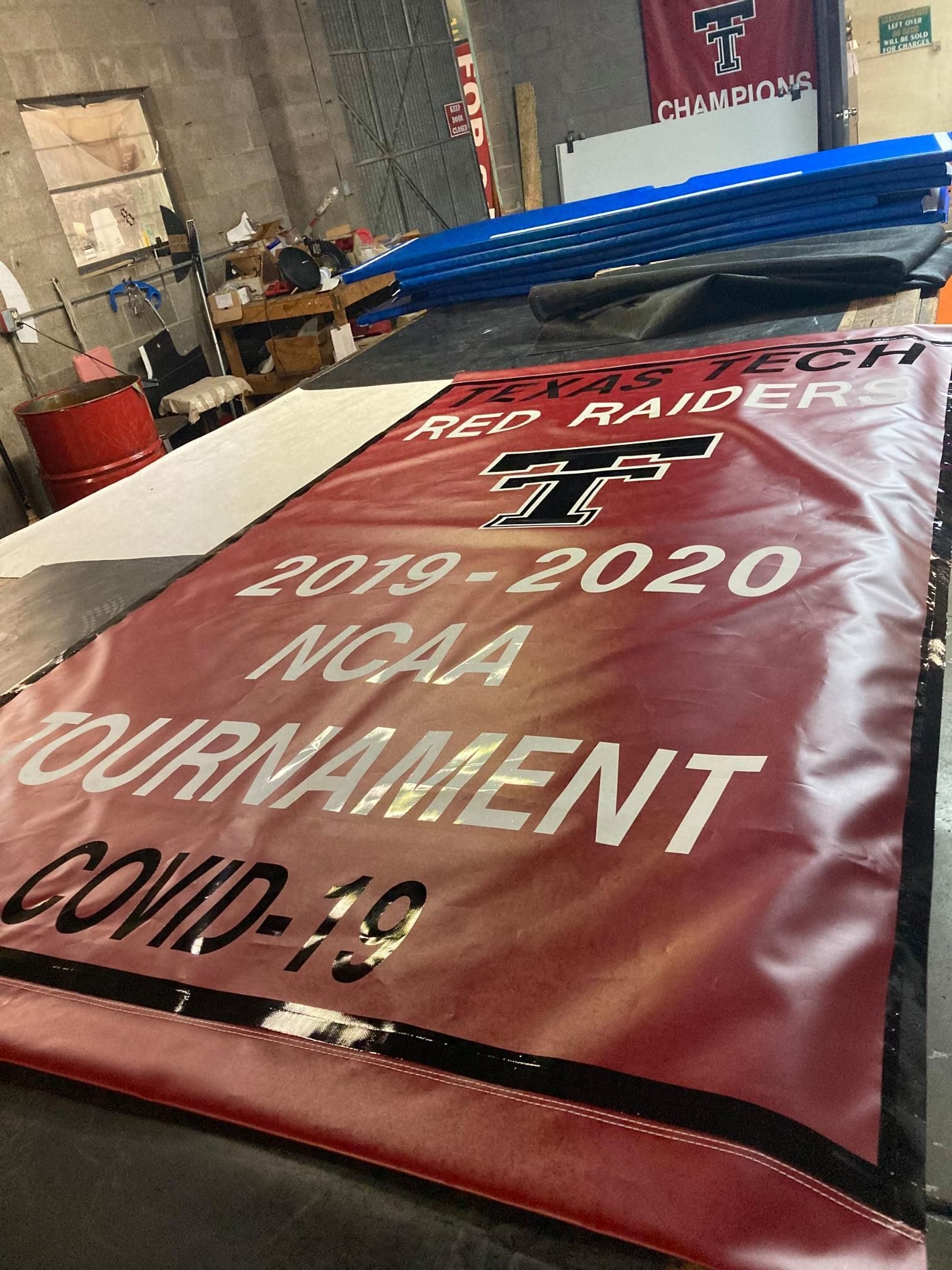 Texas Tech banner: Red, silver text, 