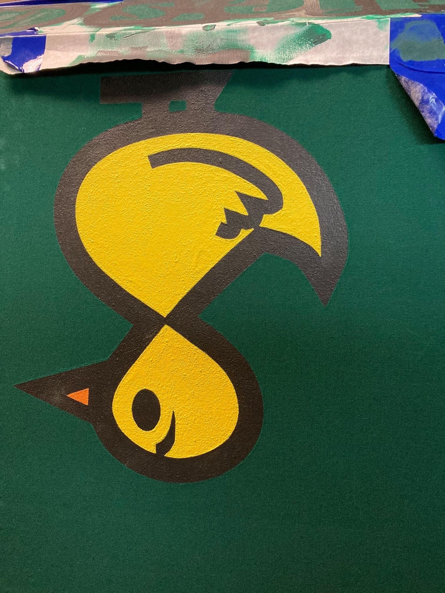 Yellow stylized bird logo with black outline on green background.